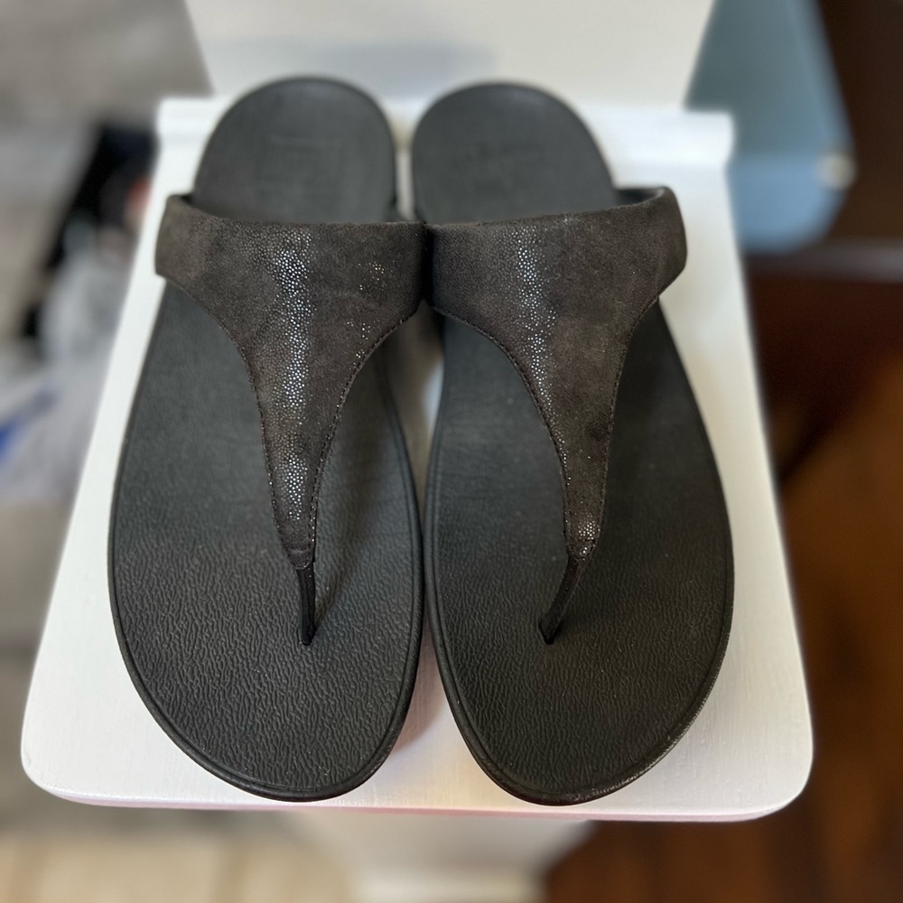 Black FitFlops with a soft brushed metallic Fabric